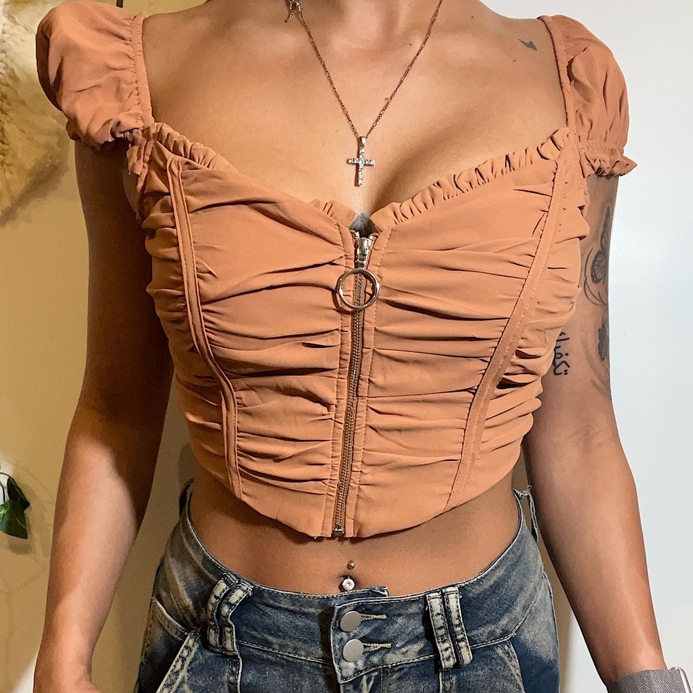 Brand new tan colored short sleeve crop top with silver zipper